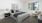Bedroom with natural lighting and high ceilings